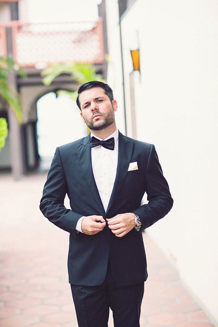 Groom in tux with bow tie Inspiration