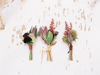 Deep colored boutonnieres Inspiration