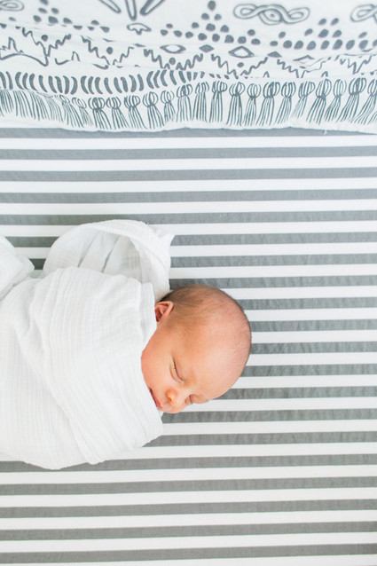 White nursery inspiration and newborn photos by Hello Pinecone