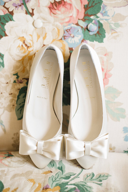 White bow wedding shoes