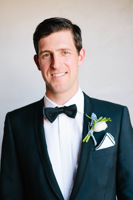 Groom with bow tie and boutonniere
