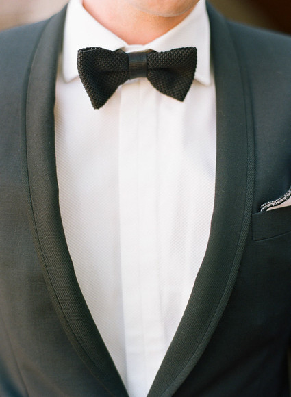 Black suit with bow tie