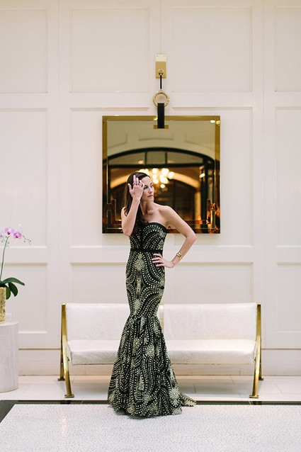 Bride in gold and black dress