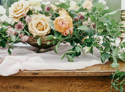 Rose and ranunculus floral centerpiece