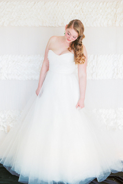 Bride in white fluffy wedding dress