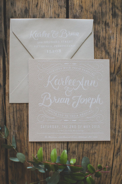 Vintage wedding cream and white invitation