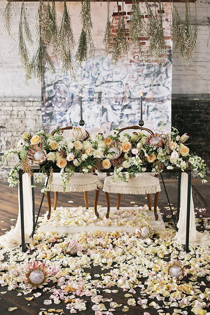 Industrial Wedding Sweetheart Table Protea Decor Inspiration