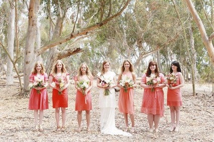 Modern Bohemian Southwestern Wedding Bridesmaids in Coral Dresses