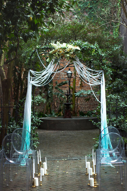 Aqua and gold wedding altar