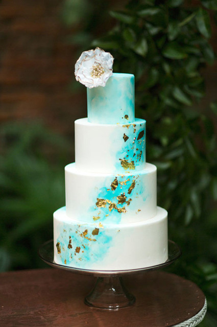 White, gold and blue modern wedding cake