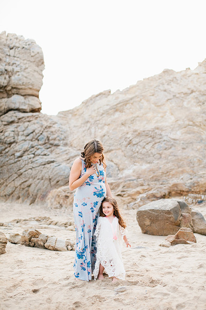 Beach maternity photos by Megan Welker