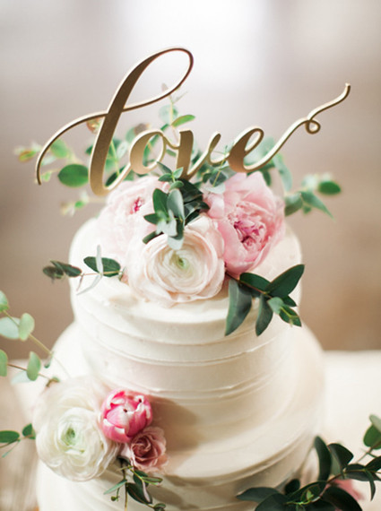 White floral cake with love cake topper