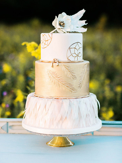 Gold and white cake with feathers Inspiration