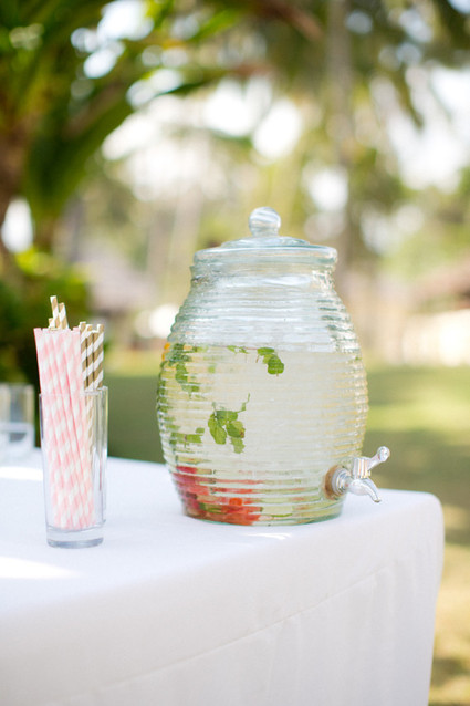 Strawberry water with pink straws