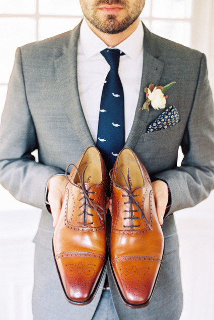 Classic men's shoes and grey suit