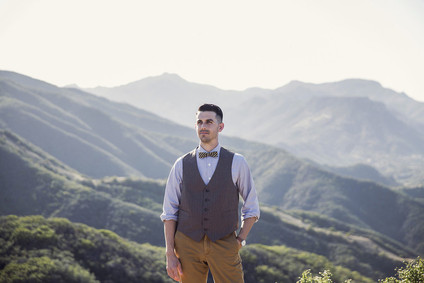 Vest and bowtie grooms attire