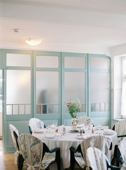 White and light blue wedding reception area