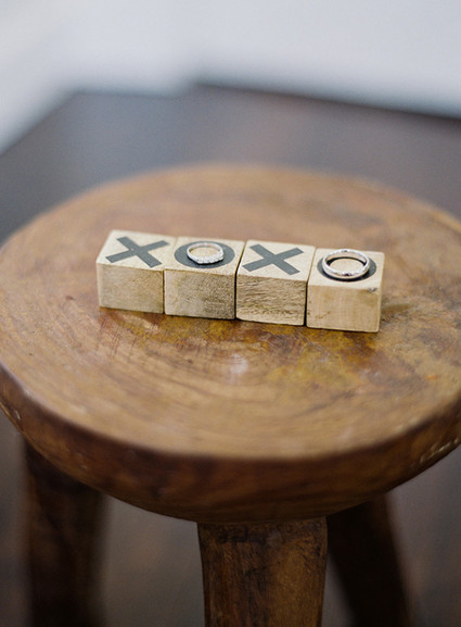 Wedding rings on wooden xoxo blocks