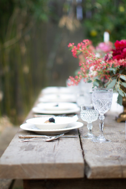 Backyard dinner party wooden tablescape