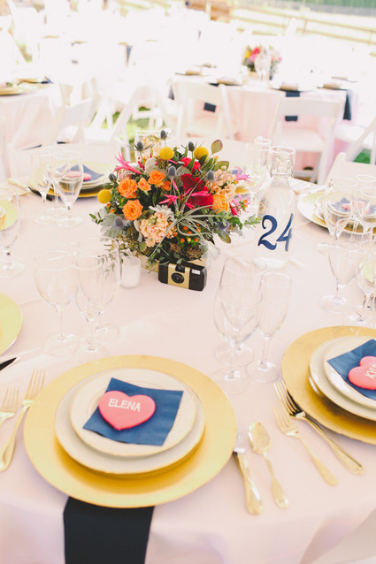 Outdoor light pink and blue place setting with heart favor