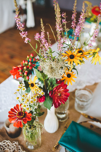 Daisy and colorful flower centerpieces