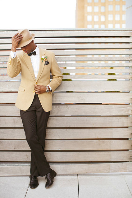 Groom in fashionable creme blazer