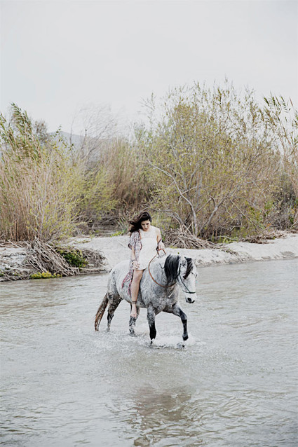 Bohemian inspired bride with white horse