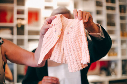 Flower girl's pink sweater