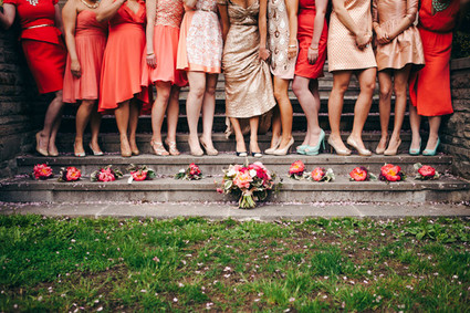 Pink and red bridesmaid with bouquets