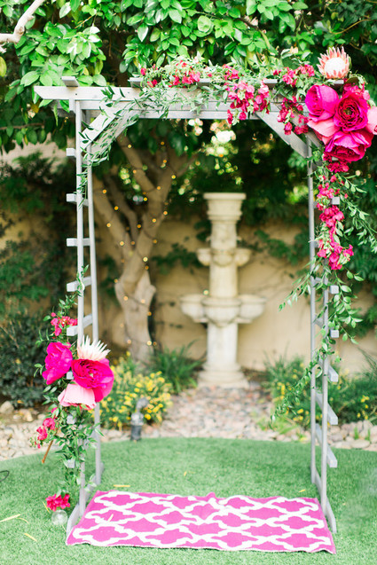 Paper flower wedding arbor