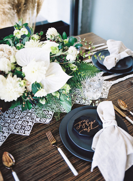 Modern black, white, and gold rehearsal dinner