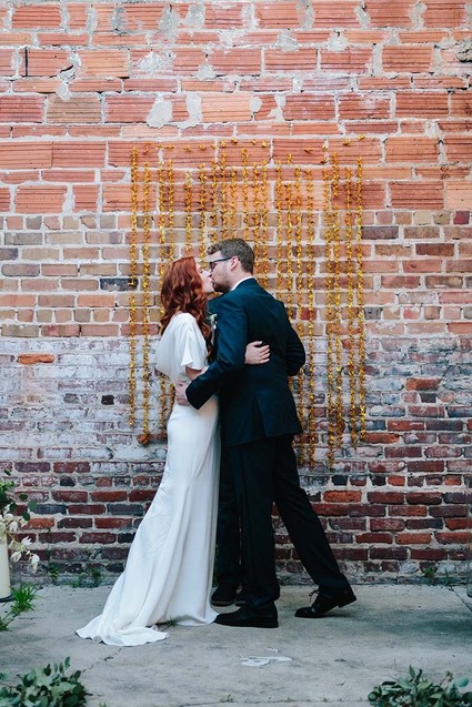 Gold paper crane ceremony backdrop,