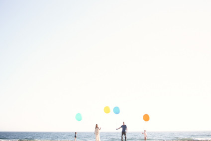 Beach anniversary shoot with kids by Max Wanger
