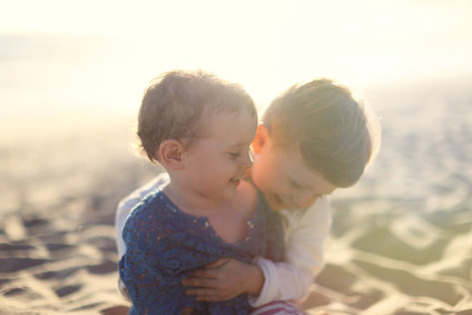 Beach anniversary shoot with kids by Max Wanger