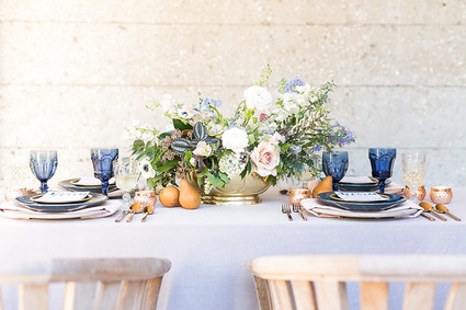 Soft blue spring wedding tablescape