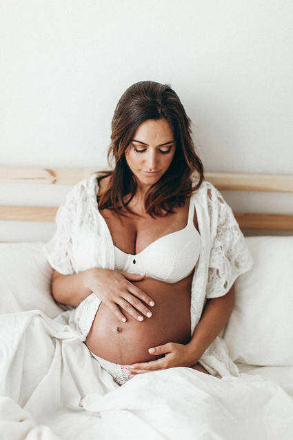 all white boudoir maternity photos