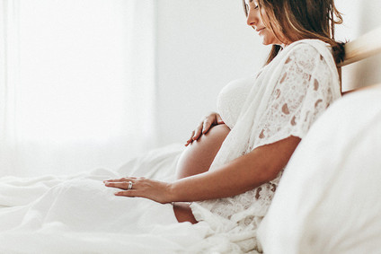 all white boudoir maternity photos