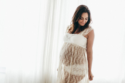 all white boudoir maternity photos