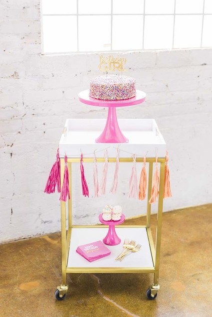 pink cake stand and bar cart