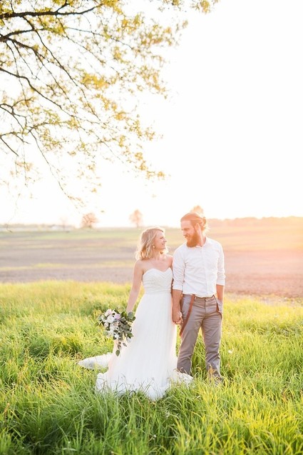 sunset wedding photos in a field