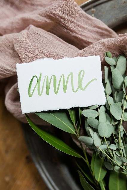 green calligraphy place cards
