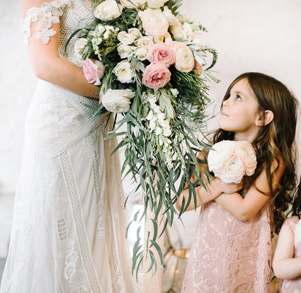 bride with flower girl