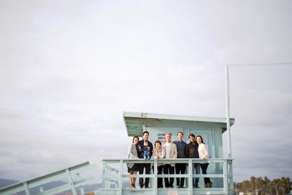 multi generation family photos at the beach