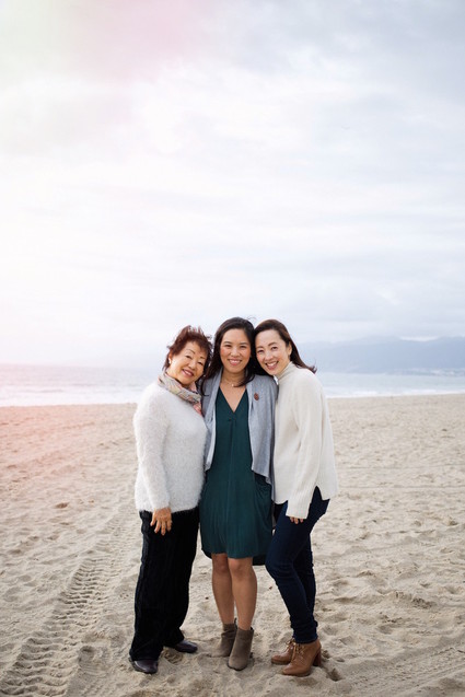 multi generation family photos at the beach