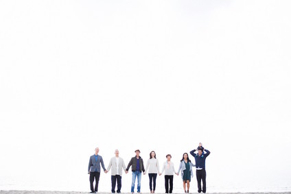 multi generation family photos at the beach