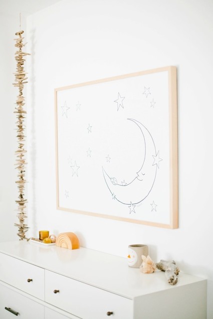 Modern, bright designer nursery by Almost Makes Perfect