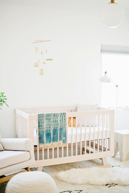 Modern, bright designer nursery by Almost Makes Perfect