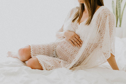 All white bohemian maternity photos