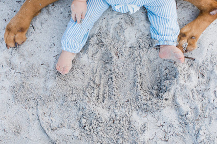 Summery matching sibling photos on the beach
