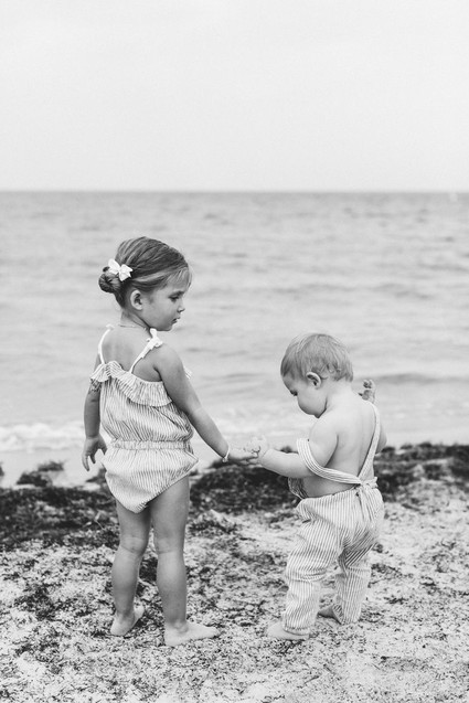 Summery matching sibling photos on the beach